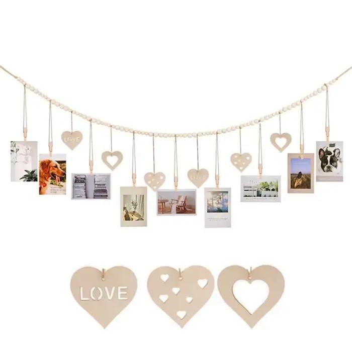 Chaîne murale porte-photos en bois avec clips à pompons et perles