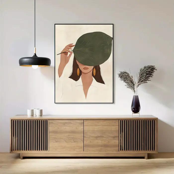 Affiche sur toile « Femme cachant son visage avec des feuilles »