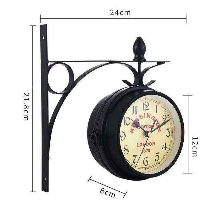 Horloge murale double face en métal