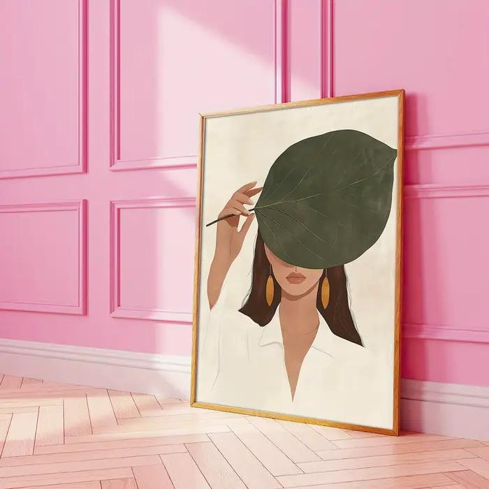 Affiche sur toile « Femme cachant son visage avec des feuilles »