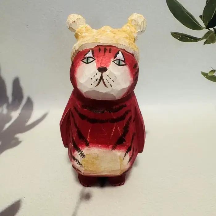 Ornement de chat en bois sculpté à la main