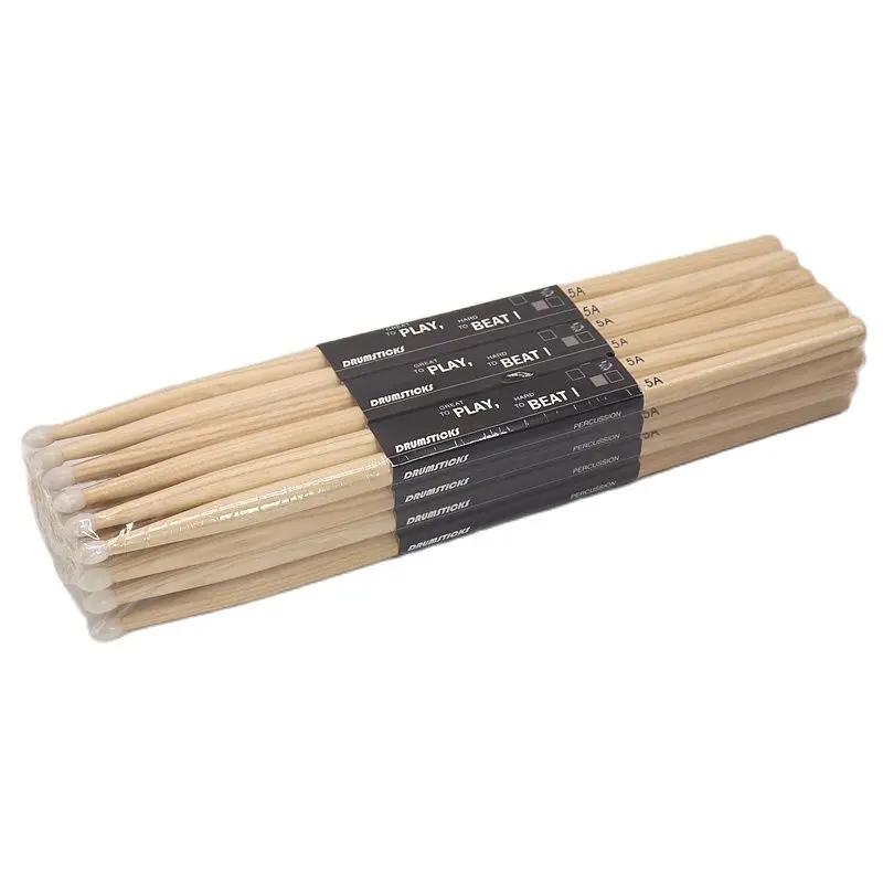 12 paires de bâtons de hickory 5A avec pointe en nylon, bâton en bois