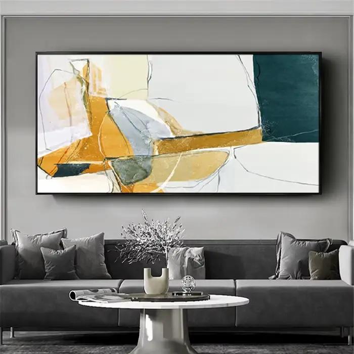 Peinture abstraite dorée et bleue peinte à la main sur toile