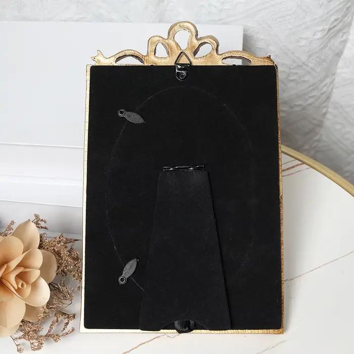 Cadre photo sculpté doré
