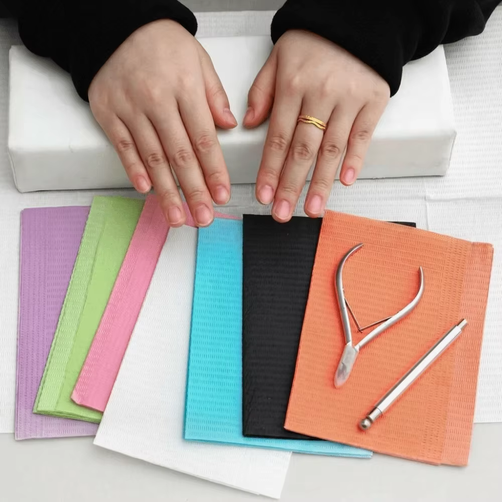 50/125 feuilles de tapis de table jetables pour nail art, imperméables et absorbants, pour tatouage, couleurs bleu, blanc, orange, vert, rose, noir