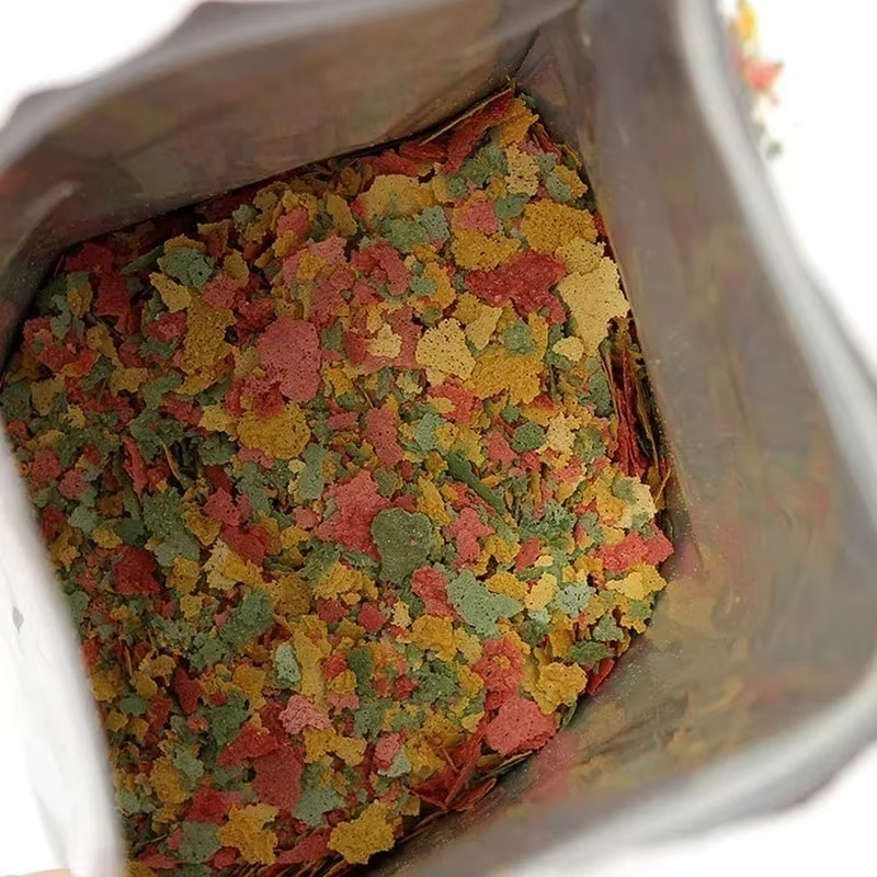 Nourriture pour poissons tropicaux en tranches fines, pour la croissance et l'amélioration de la couleur, type universel flottant pour poissons d'ornement